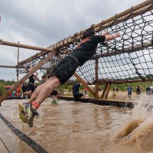 Net Jump: Jump across water, grab a net of ropes, swing over to the other side, somehow hold on to it and scramble over