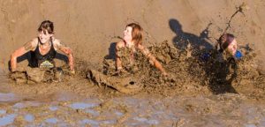 Trenches: Below barb wire, through tunnels or under wooden planks, crawl through heaps of mud